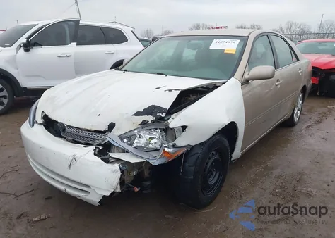 2002 Toyota Camry Le from USA, damaged, VIN 4T1BE32K72U073996